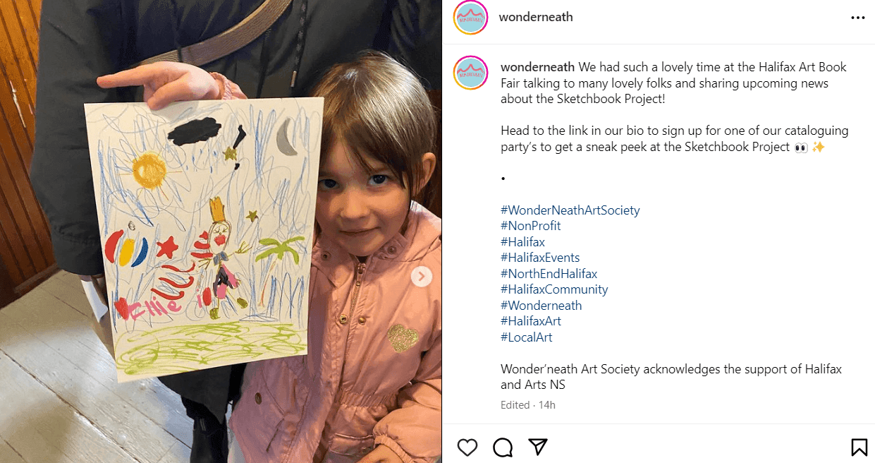 Child displaying colorful hand-drawn artwork in social media post about art project