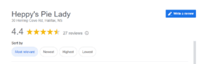Business profile with star rating and review count alongside write review button