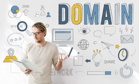Man holding notebook and pen in front of DOMAIN text and web icons