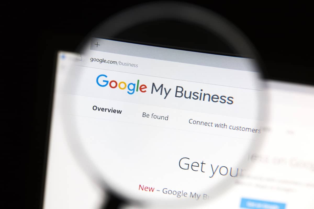 Google My Business interface viewed through magnifying glass